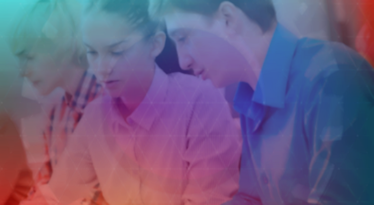 Colleagues collaborating together at a desk with overlaid digital graphics